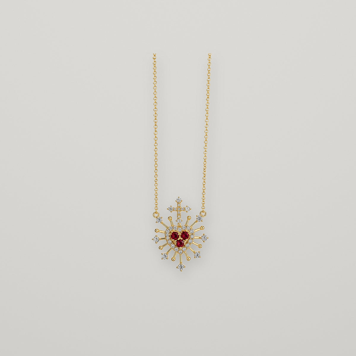sagrado corazon trepaud de rubies y diamantes 9k